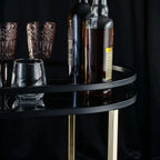 Sleek Black Serving Cart with Gold Trim - grahsajja