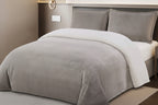 Brown textured comforter on a bed in a bedroom setting