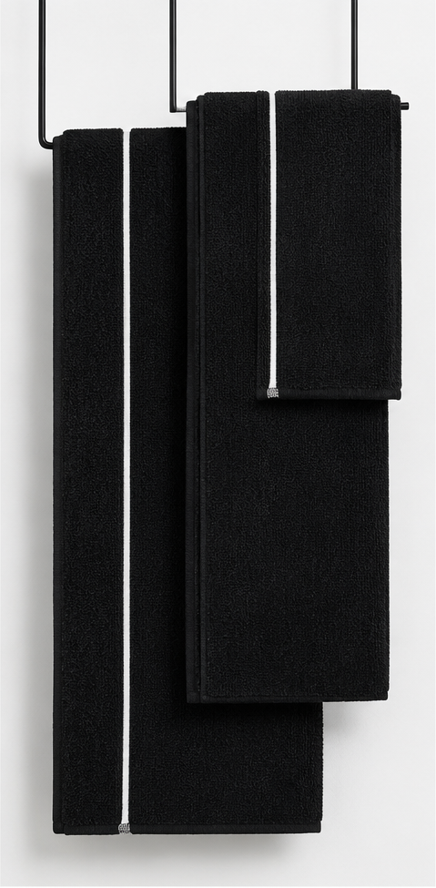 Black bamboo cotton towel with a white border.