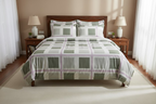 Bed with plaid comforter and pillows in a bedroom setting