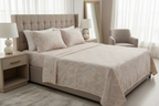 Beige fabric with white floral pattern on a flat surface