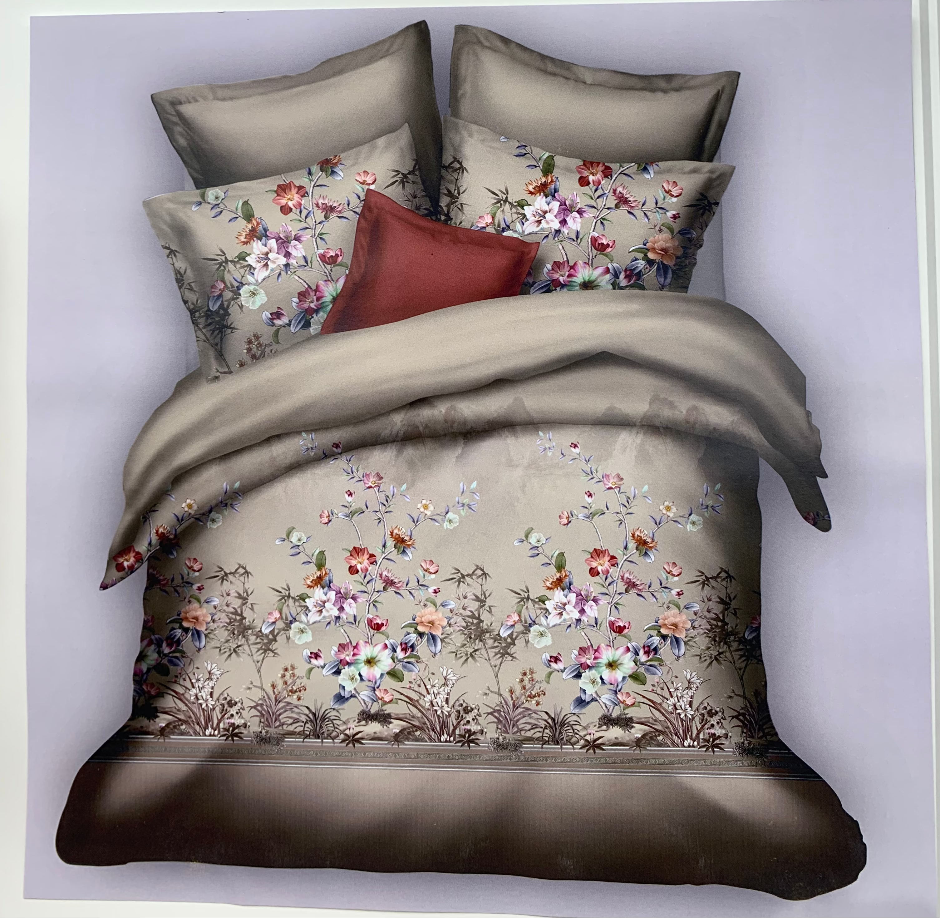 Floral bedding set with pillows and a comforter, featuring the Rochelle France brand.