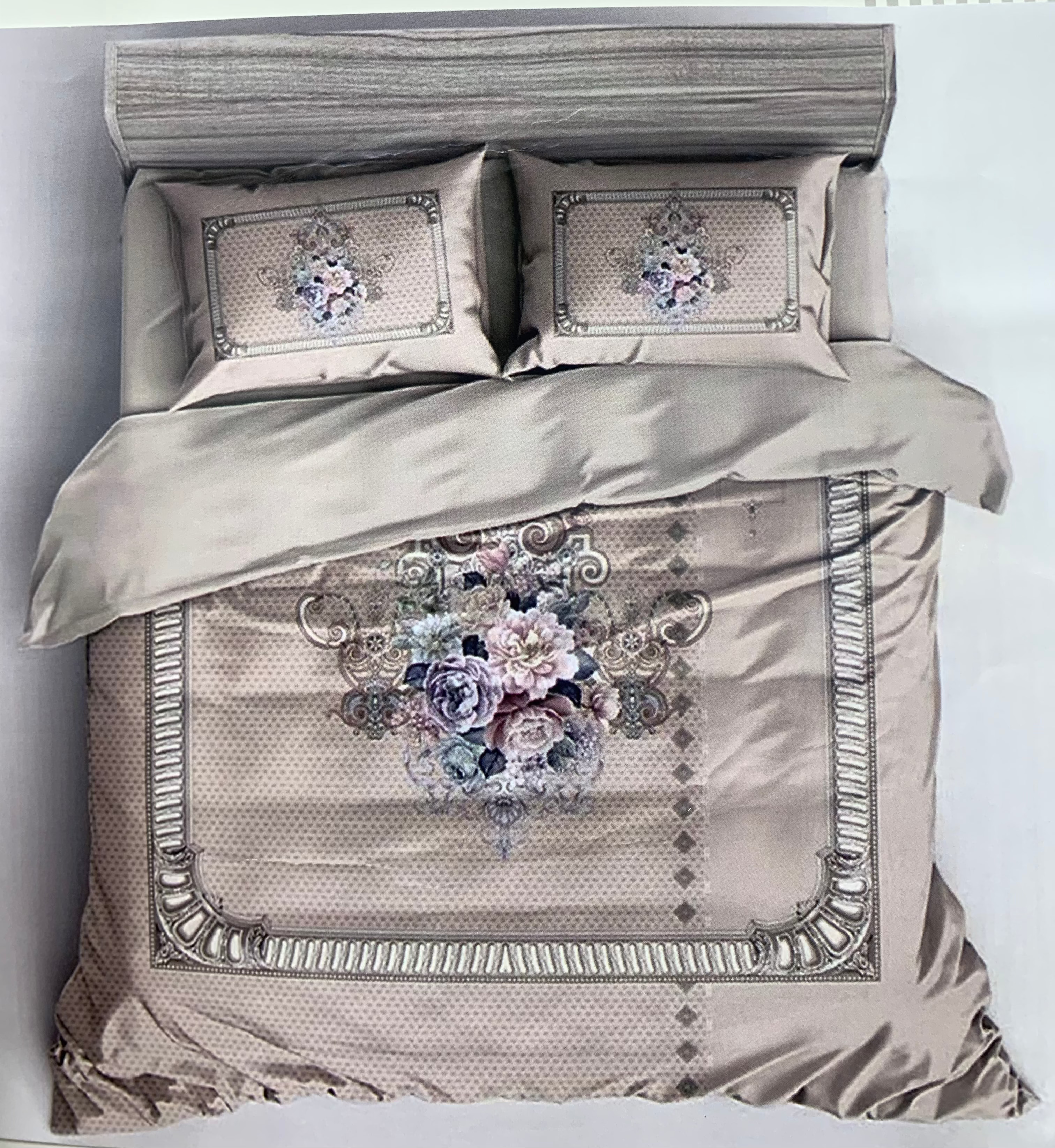 Decorative bedspread set with floral patterns on a white background, featuring the brand 'Rochelle France'.