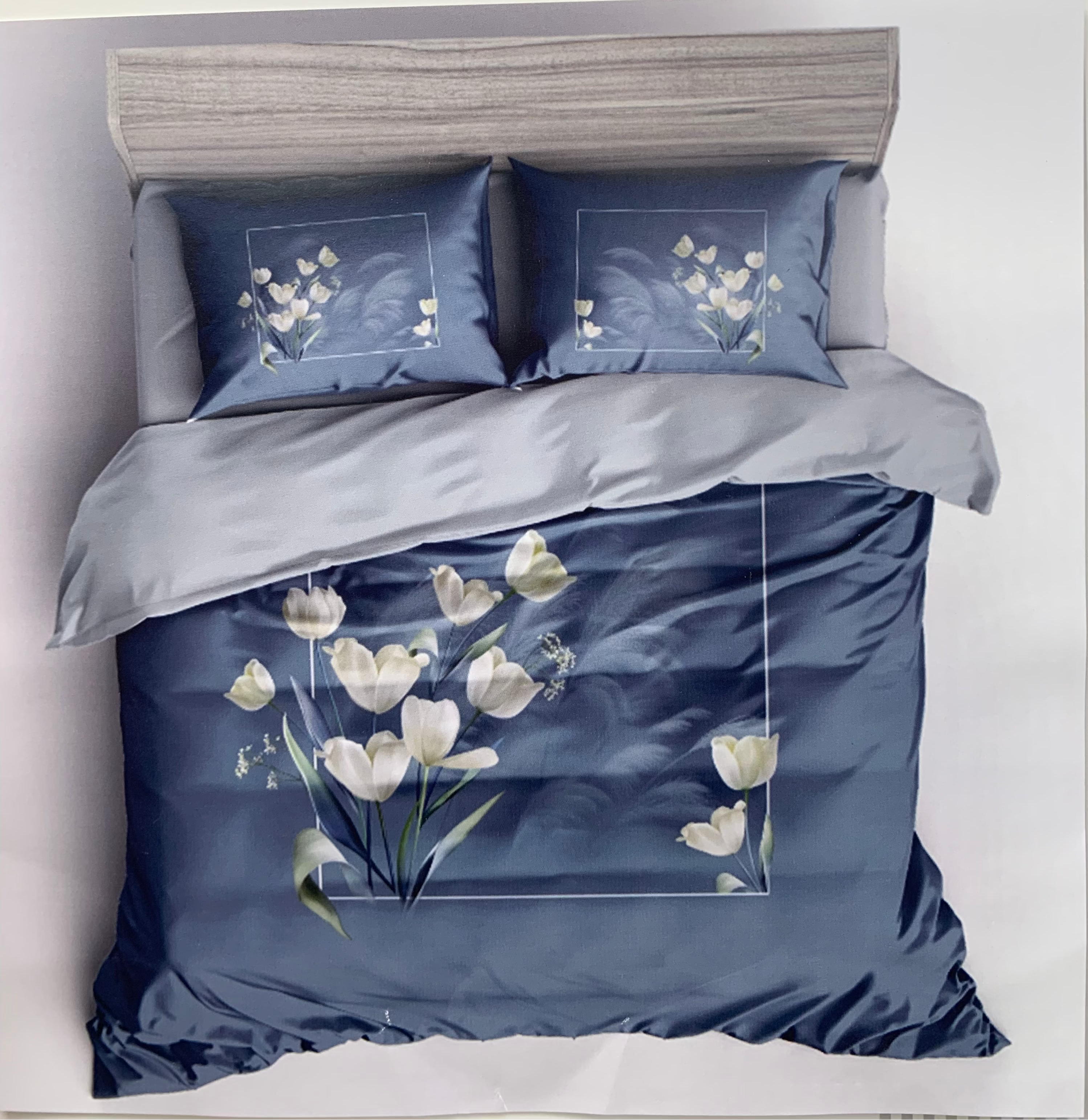 Bedding set with floral design on a white background, featuring the brand 'Rochelle France'.