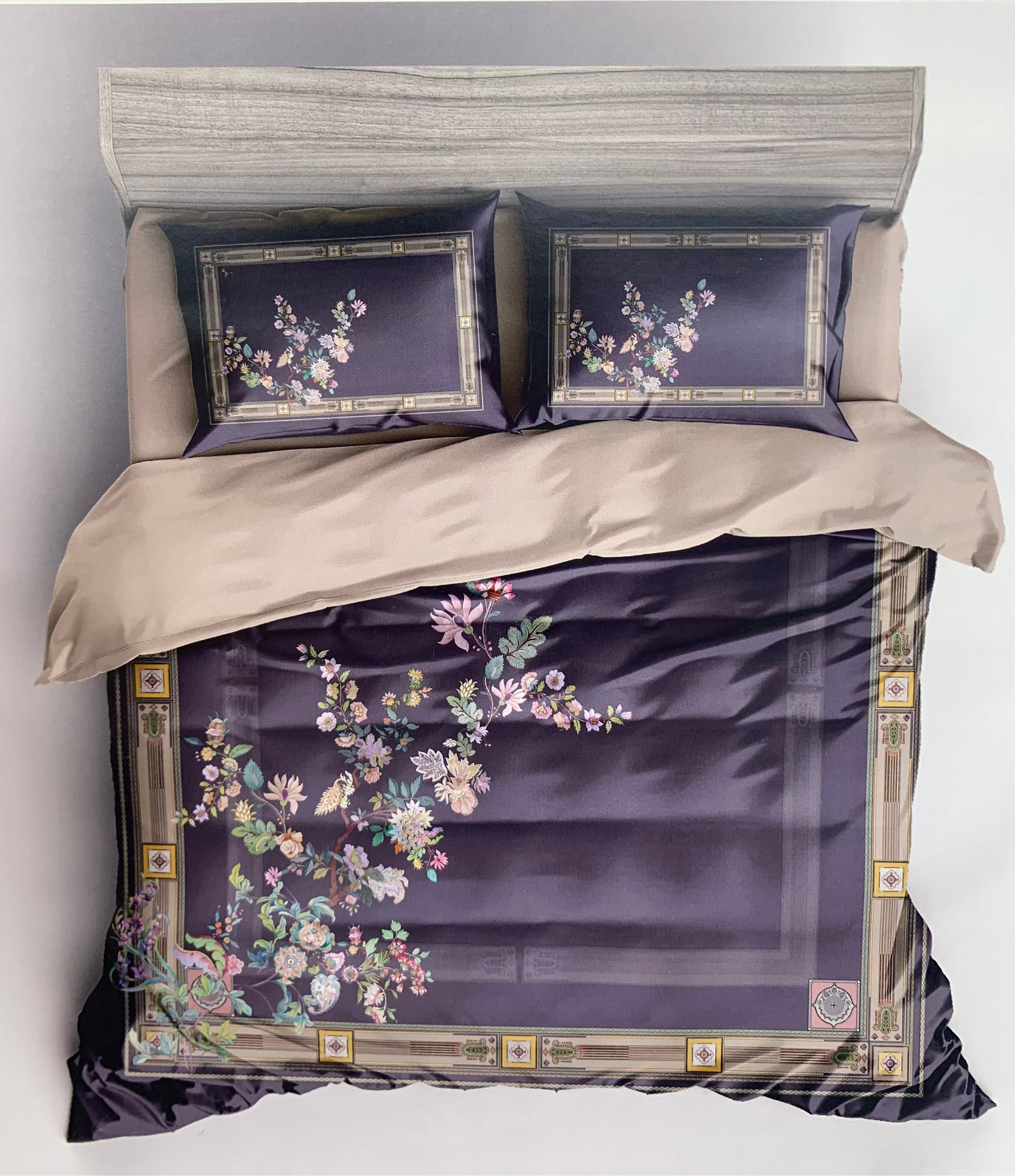 Floral patterned bedding set with decorative pillows on a bed.