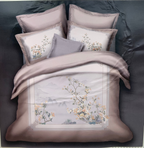 Bedding set with floral patterns and 'Rochelle France' branding.