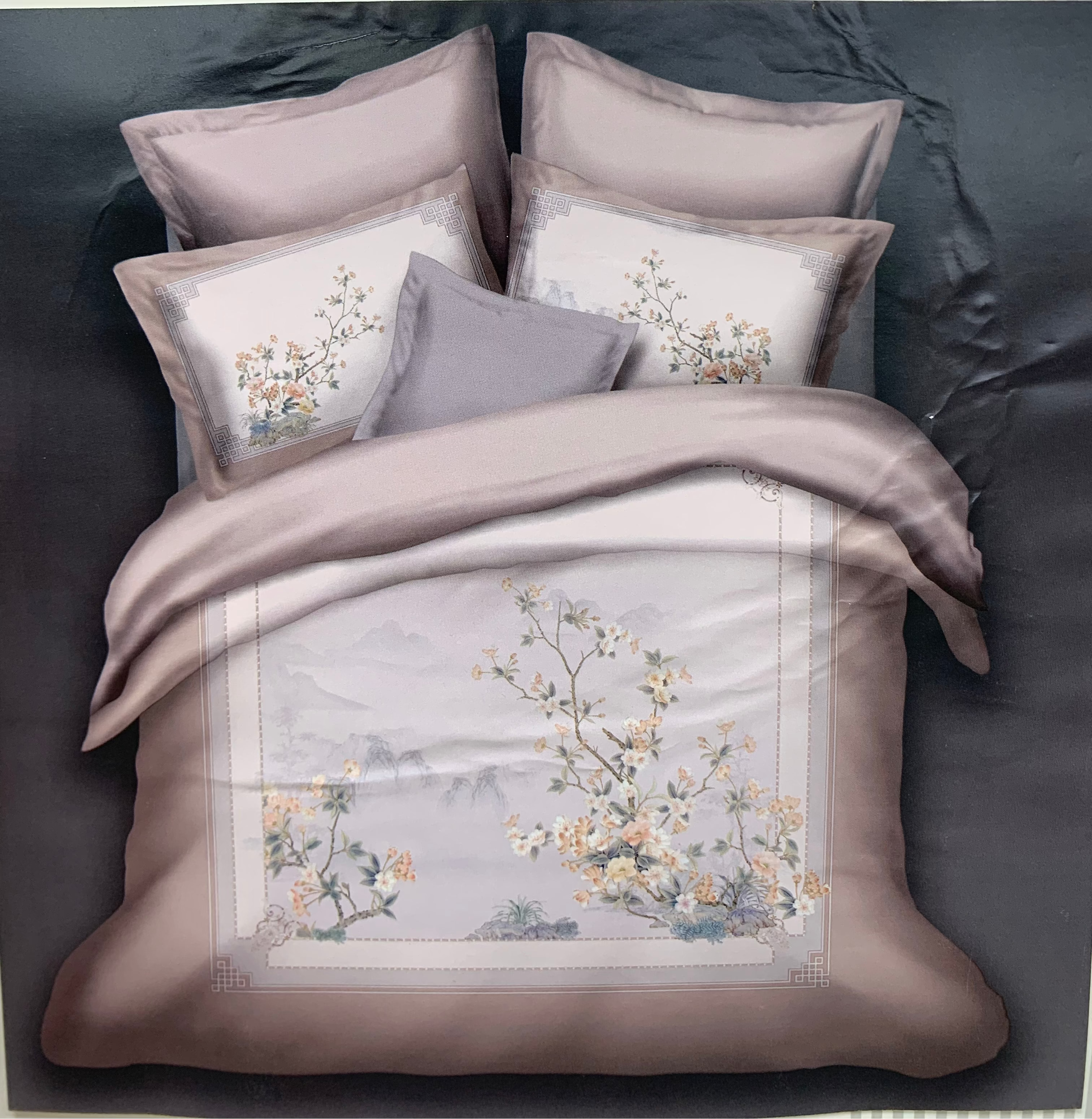 Bedding set with floral patterns and 'Rochelle France' branding.