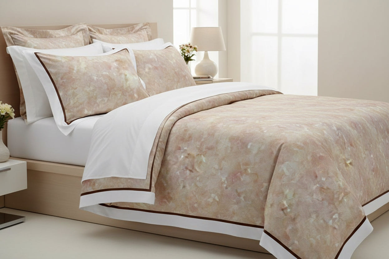 Decorative pillows with a marble-like pattern on a light gray background