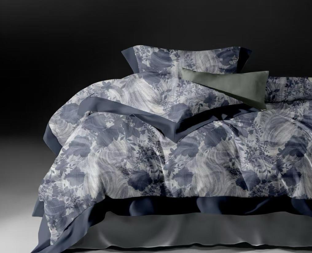 Floral patterned bedding set on a bed with a dark background